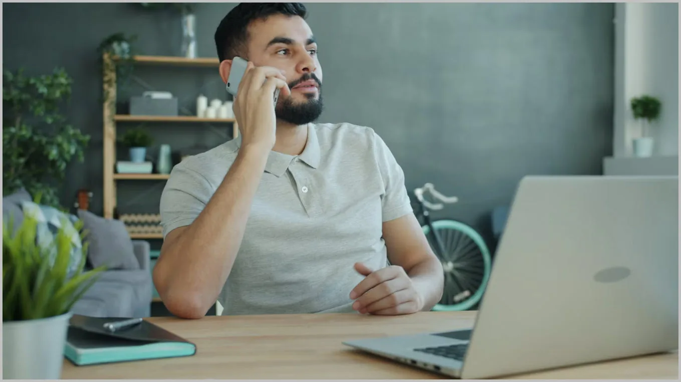 Home service professional speaking with a customer by phone